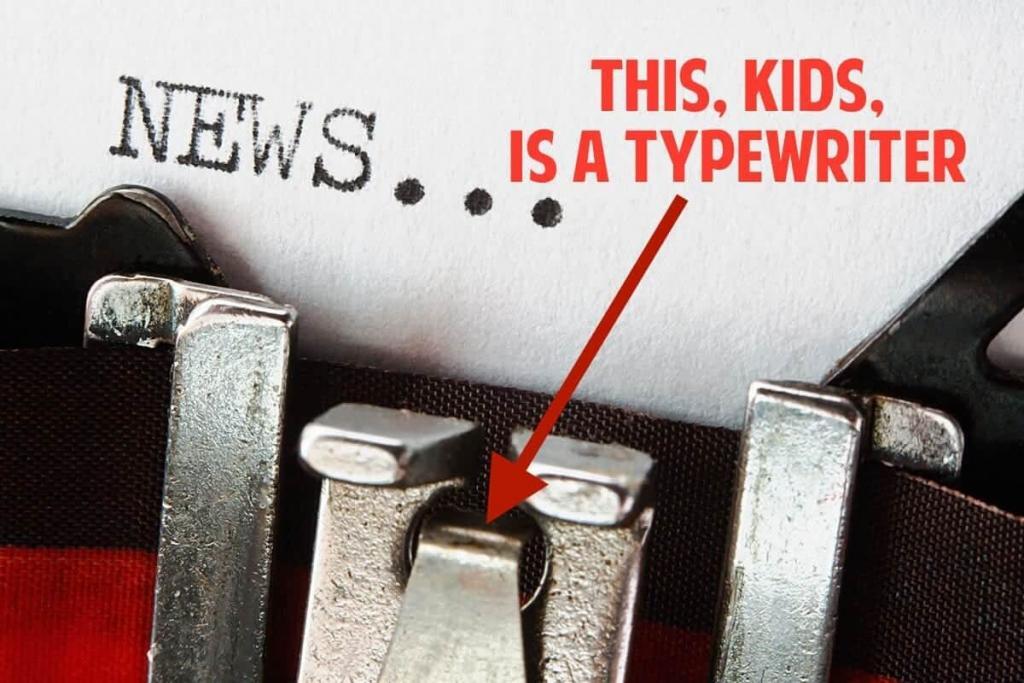 Close-up of a typewriter with a piece of paper showing the word "NEWS..." in typewriter font. A red arrow points to the typebars with the humorous text "THIS, KIDS, IS A TYPEWRITER" written in red.