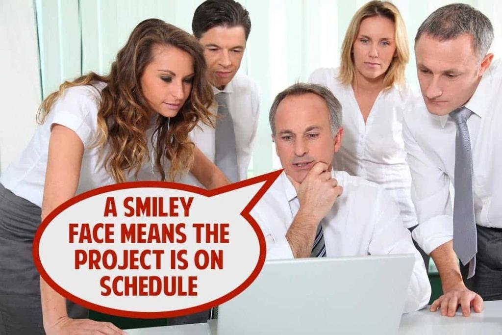 A group of five office workers, two women and three men, are gathered around a laptop. One man, seated, looks at the screen while the others stand and also focus on the laptop. A speech bubble near the seated man says, "A smiley face means the project is on schedule.