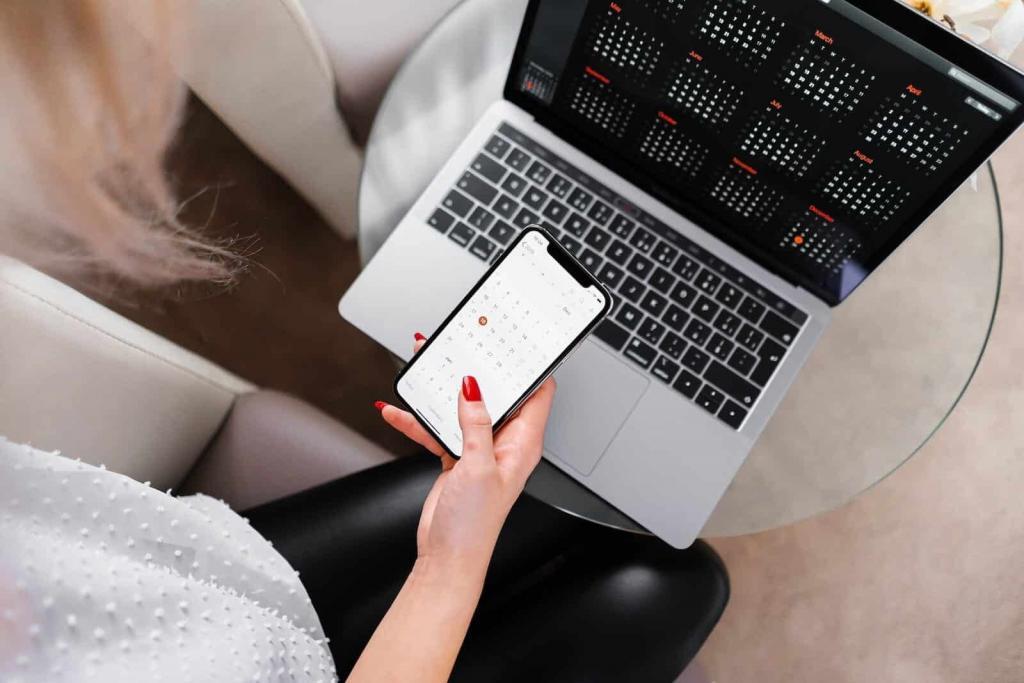 Woman with laptop and phone